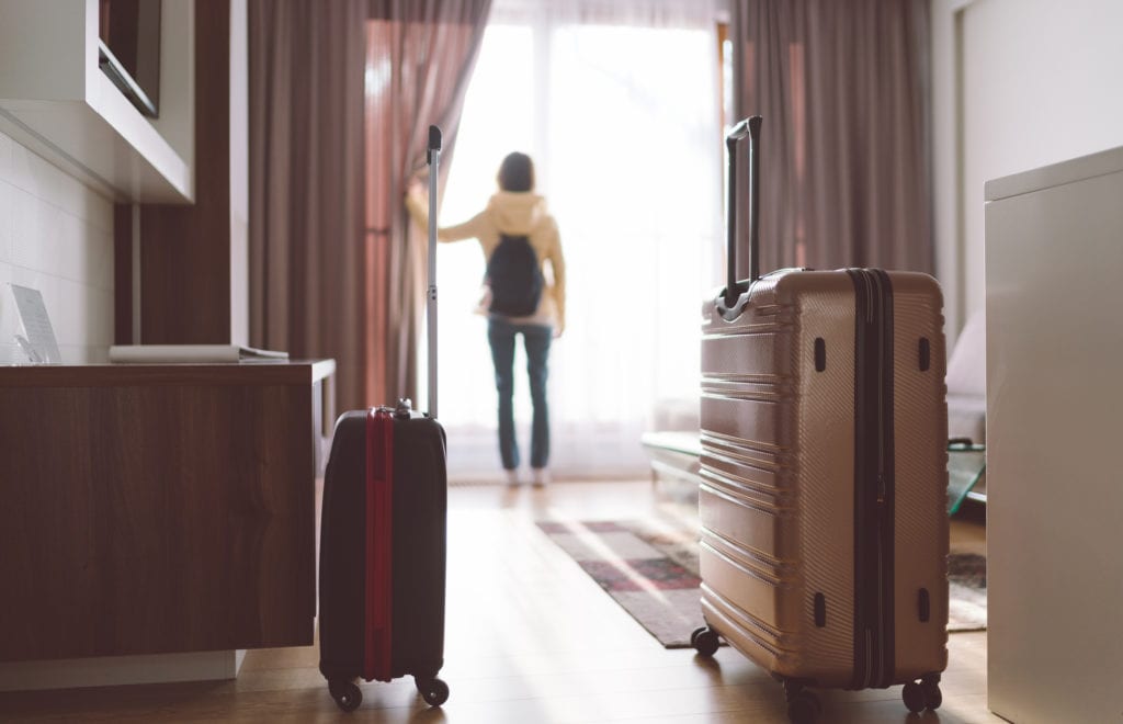 Woman staying in an affordable hotel