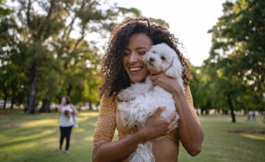 Woman and small dog looking for pet friendly temporary housing.